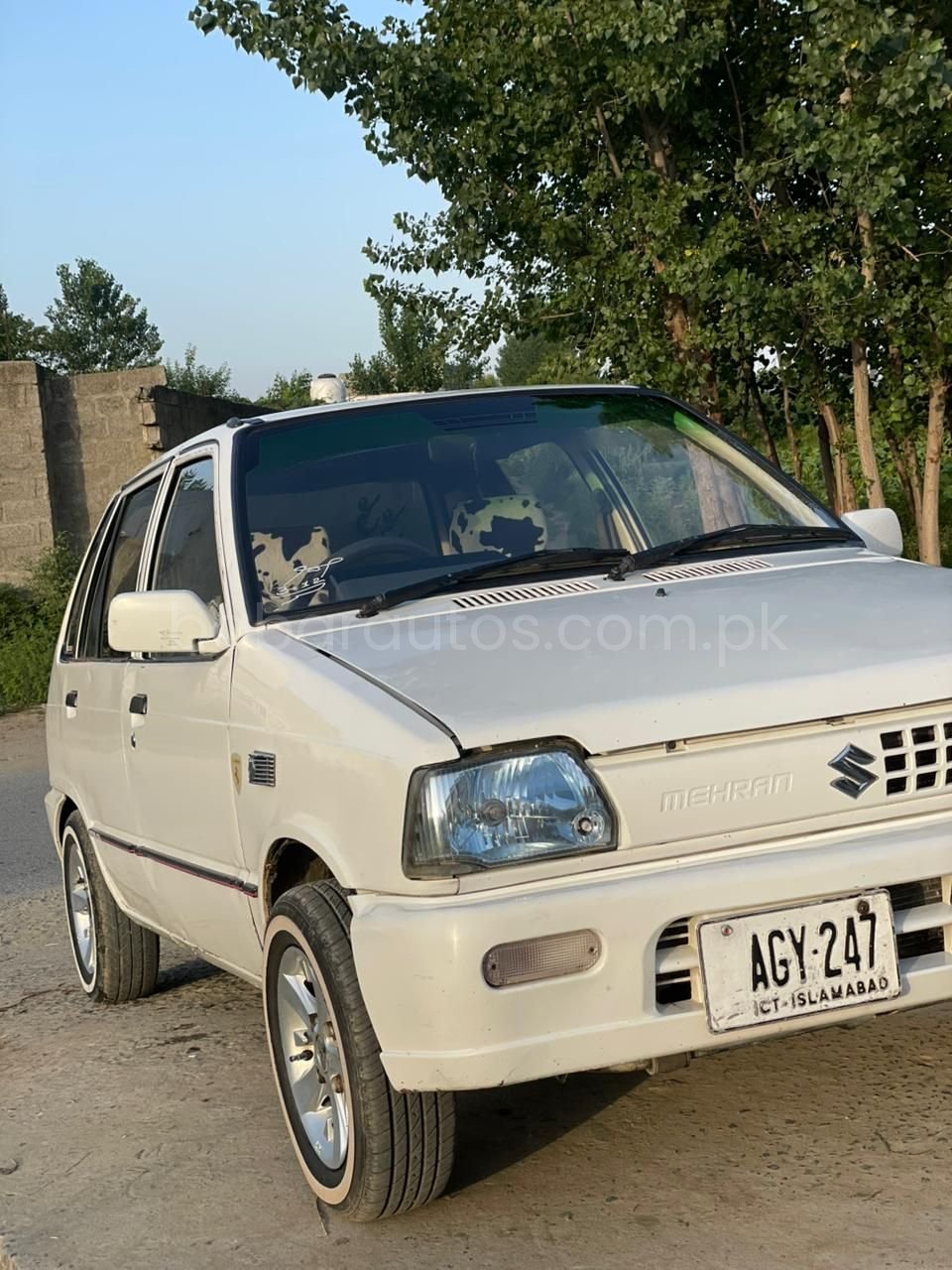 Mehran 2018 model Islamabad number white clr